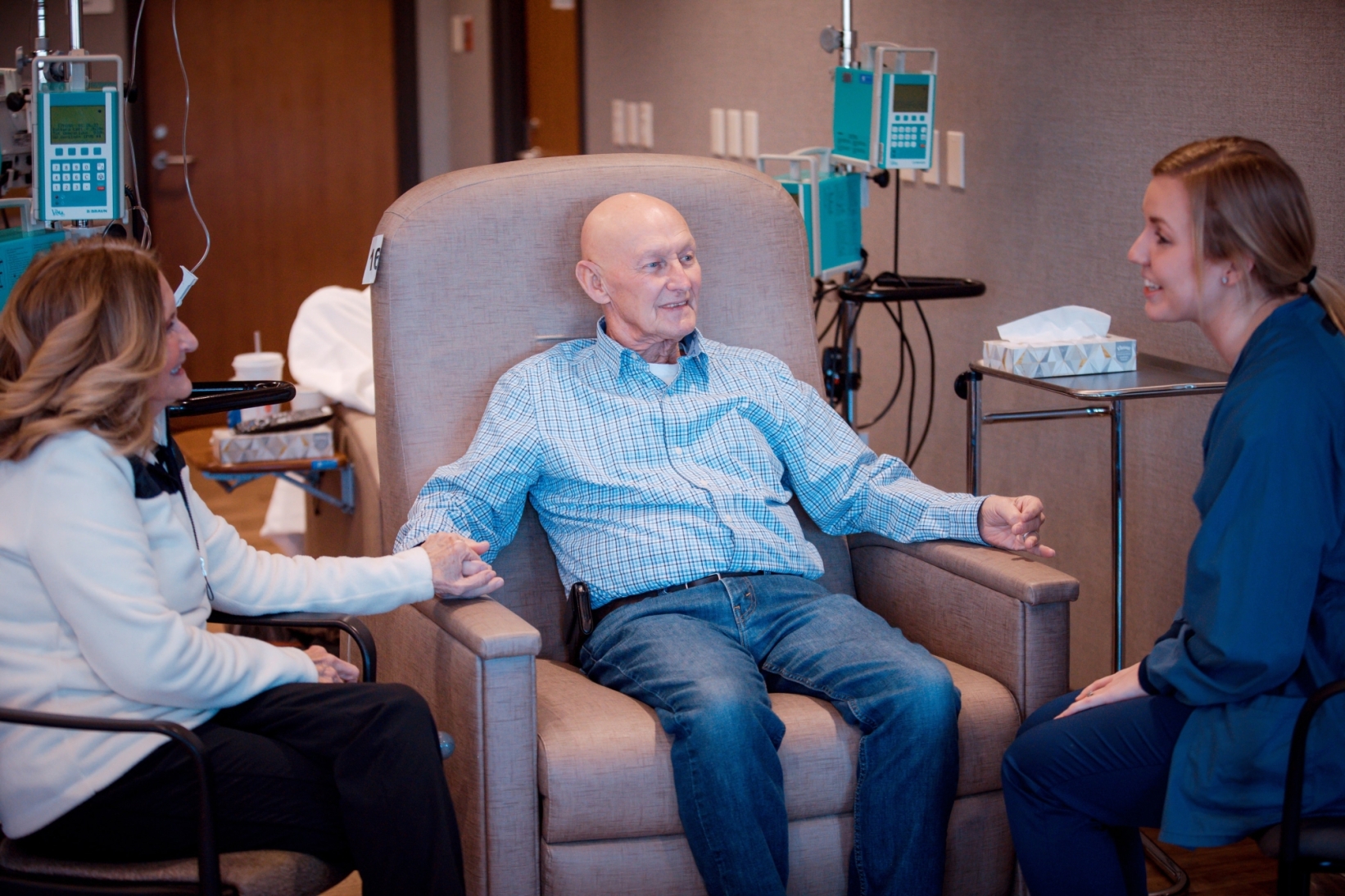 Staff talking to patient